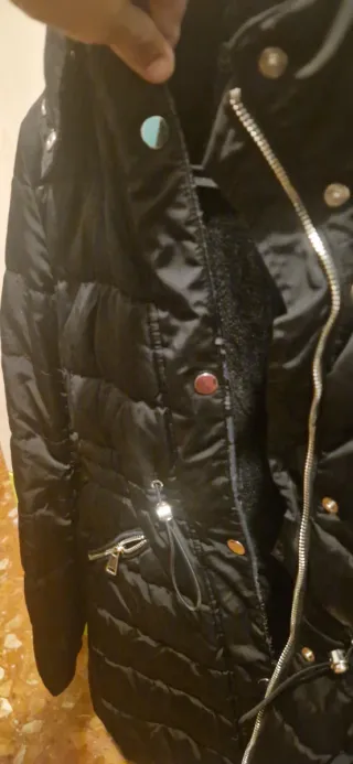 Chaqueta plumífero, rellena con pluma de pato.