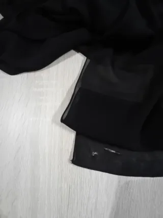 Gonna corta sotto e lunga trasparente nera