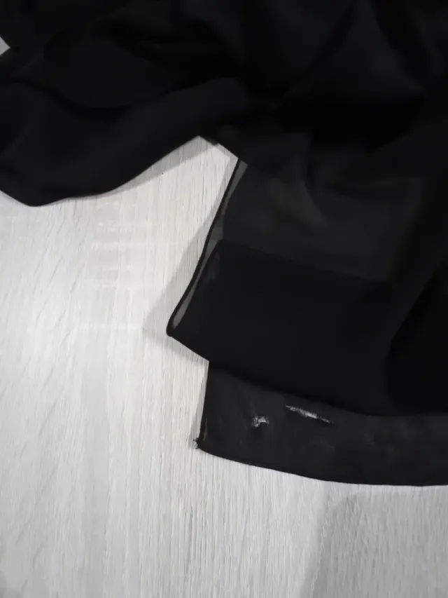 Gonna corta sotto e lunga trasparente nera