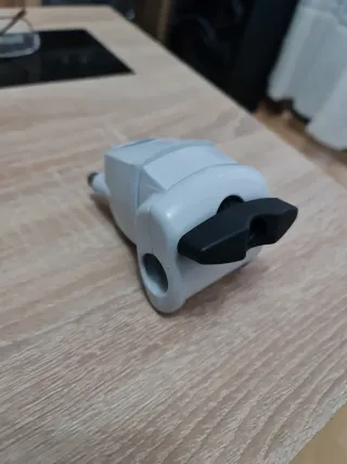 Abrazadera para desbrozadora