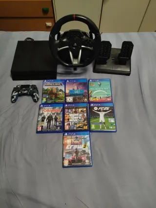 PlayStation 4 1TB + Volante + 7 Giochi