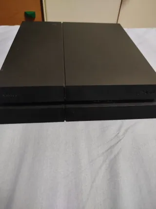 PlayStation 4 1TB + Volante + 7 Giochi