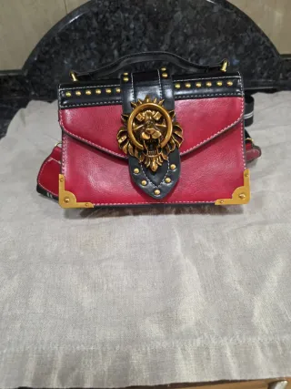 Bolso original con cabeza de león