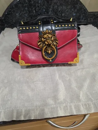 Bolso original con cabeza de león