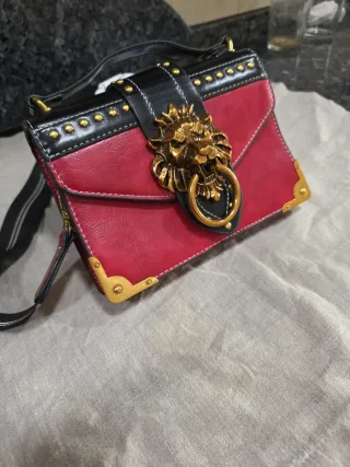 Bolso original con cabeza de león