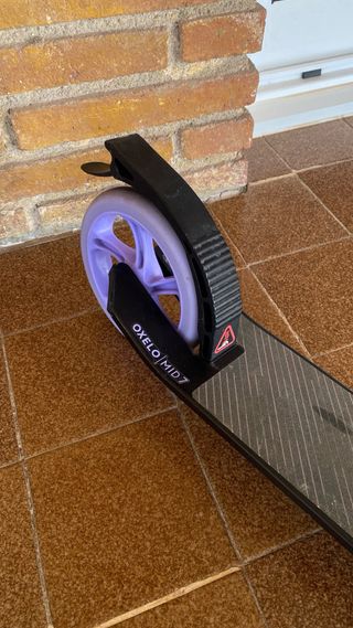 Patinete Decathlon Negro y Lila Plegable