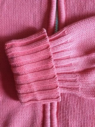 Chaqueta de punto rosa con cremallera