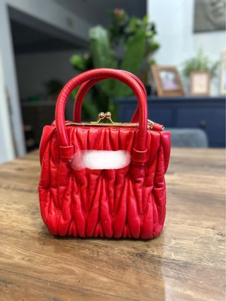 Bolso bandolera de cuero cordero