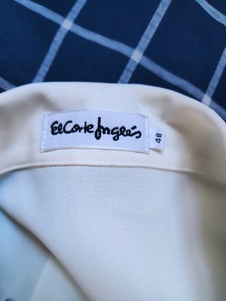 Blusa de manga larga color marfil. El corte Inglés