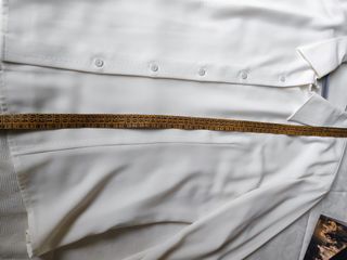 Blusa de manga larga color marfil. El corte Inglés