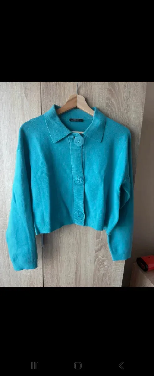 Cárdigan Parfois azul turquesa.
