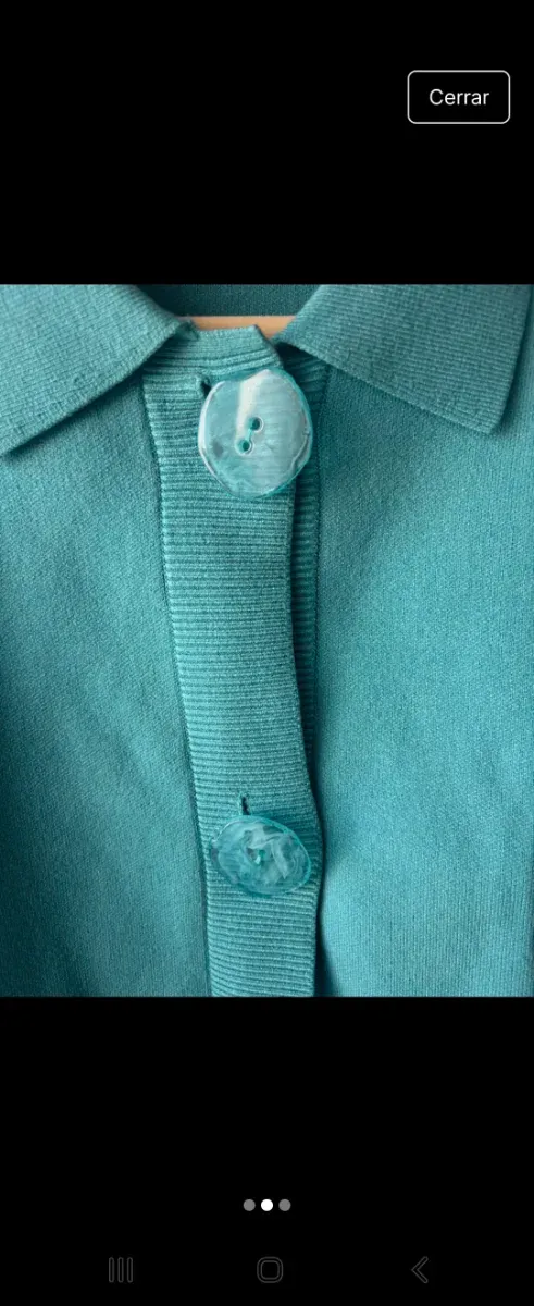 Cárdigan Parfois azul turquesa.