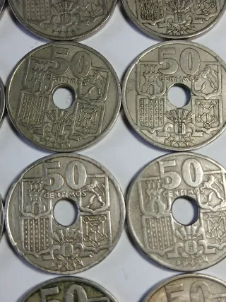 FLECHAS INVERTIDAS. 20 monedas.