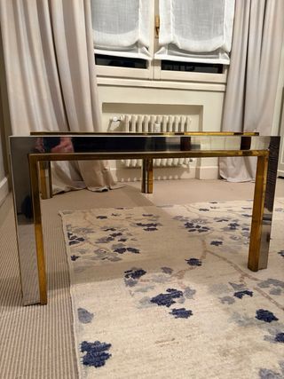 Tavolo da centro in acciaio e ottone