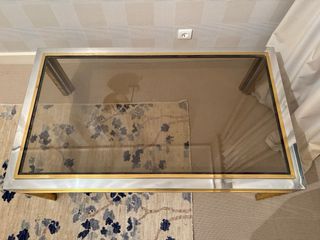 Tavolo da centro in acciaio e ottone