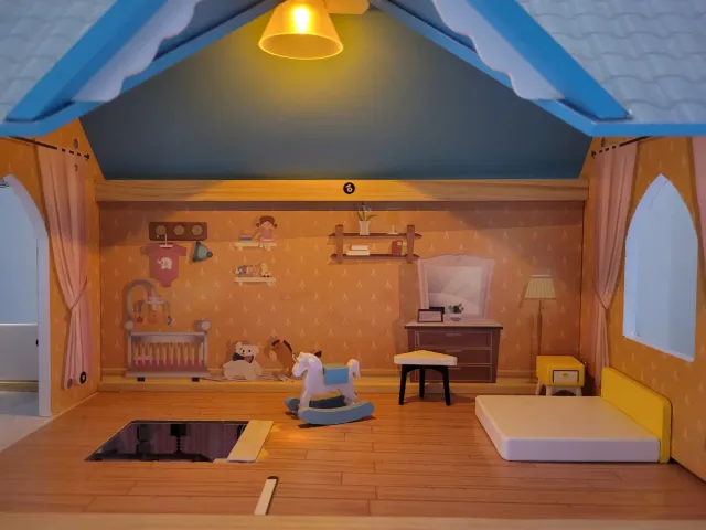 Casa de muñecas de madera