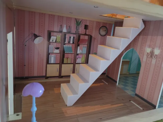 Casa de muñecas de madera