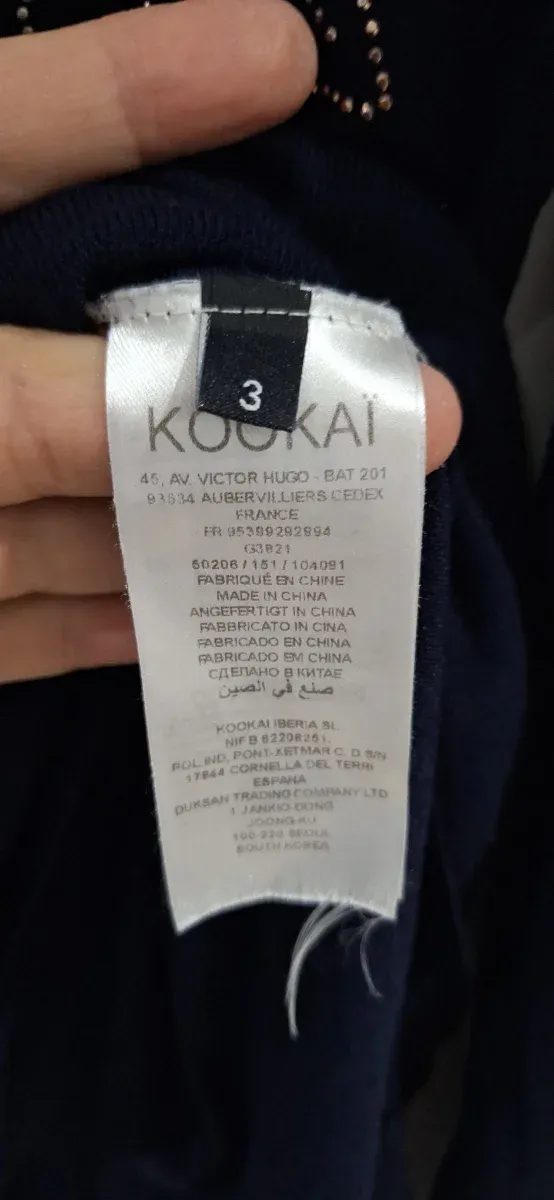 Jersey cuello pico con aplicaciones