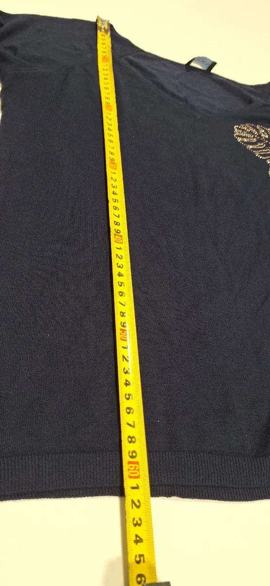 Jersey cuello pico con aplicaciones