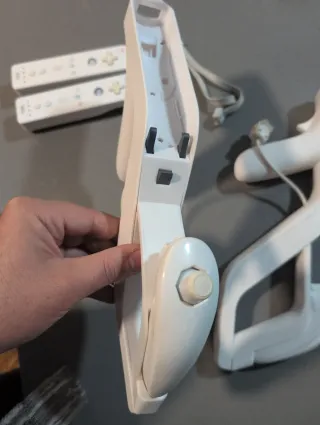 2 Mandos Nunchuk Wii + Pistolas