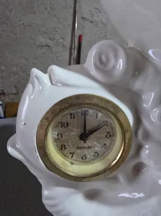 Soprammobile cavallo in ceramica con orologio