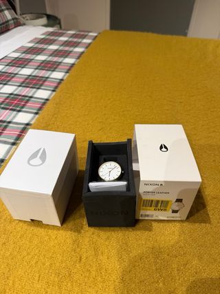 Reloj Nixon Dorado y Blanco