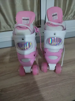 Patines infantiles rosas y blancos