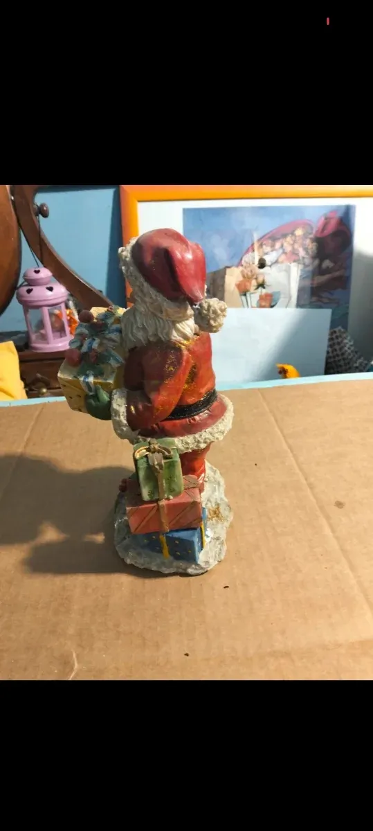Babbo Natale in resina con regali
