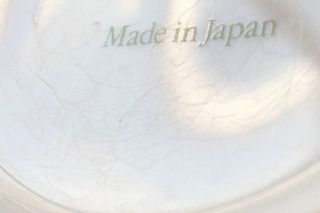 Tetera de porcelana con flores