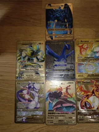 Lote 7 cartas Pokémon metálicas variadas