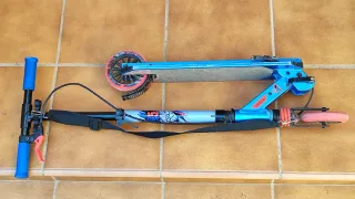 Patinete infantil azul y negro