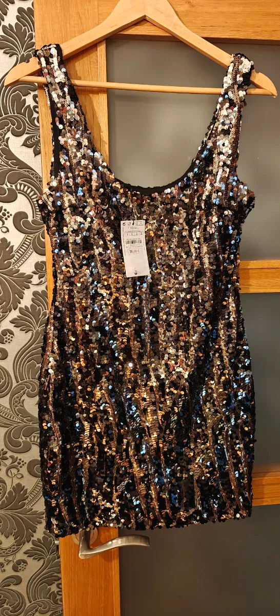 Vestido fiesta lentejuelas negro y dorado