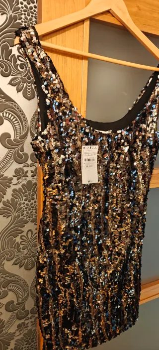 Vestido fiesta lentejuelas negro y dorado