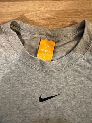 Camiseta Nike NOCTA Gris