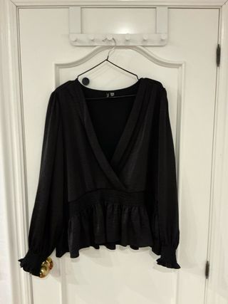 Blusa elegante escote V cintura ceñida