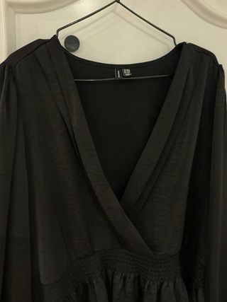 Blusa elegante escote V cintura ceñida