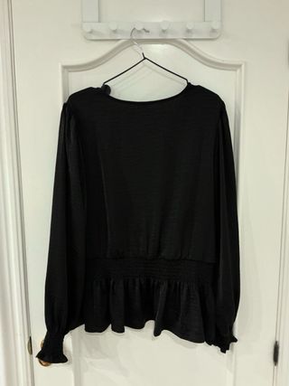 Blusa elegante escote V cintura ceñida