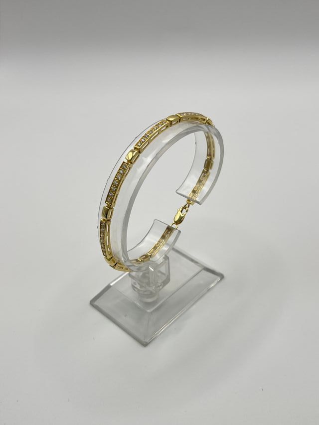 Bracciale in oro 18k con ciondoli di zirconi Peso: 10 gr.