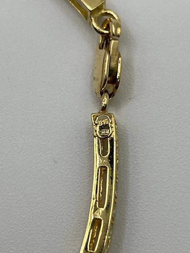 Bracciale in oro 18k con ciondoli di zirconi Peso: 10 gr.