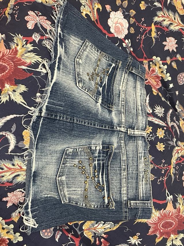 Falda vaquera mini desgastada
