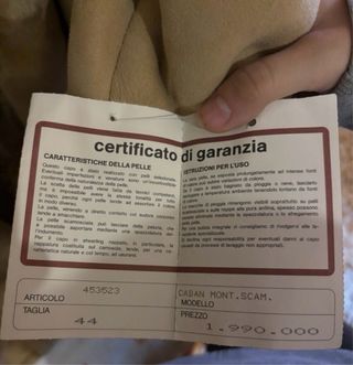 Cappotto in pelle scamosciata con pelliccia