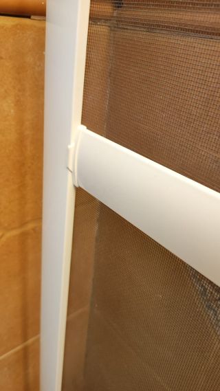 Mosquitera fija corredera blanca