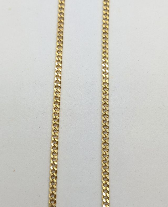 Cadena Barbada de oro de 18k, 17.33 g, 61 cm.