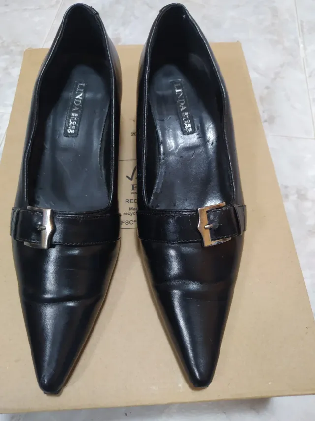 Décolleté nere con fibbia