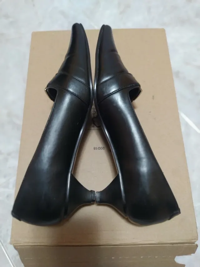 Décolleté nere con fibbia