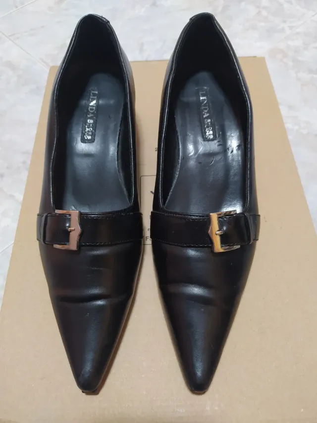 Décolleté nere con fibbia