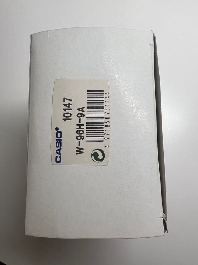 Caja de reloj Casio azul y plateada