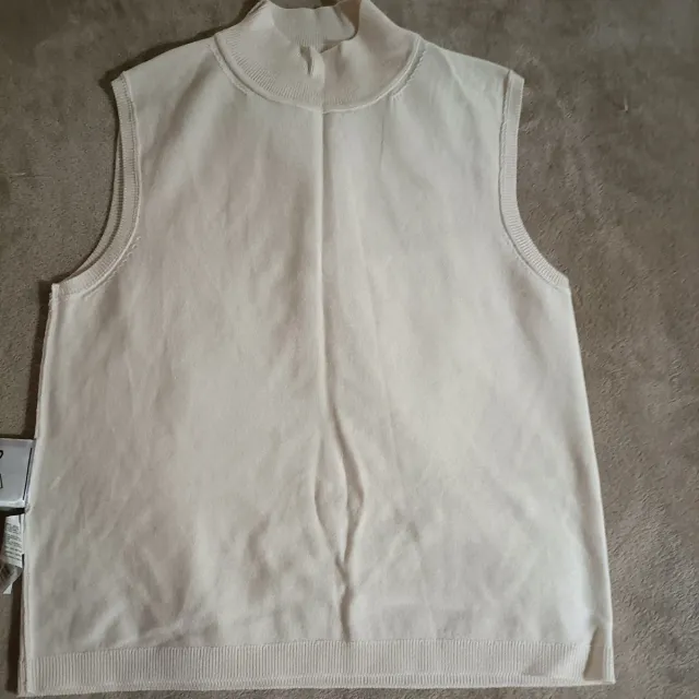 Chaleco de punto beige sin mangas