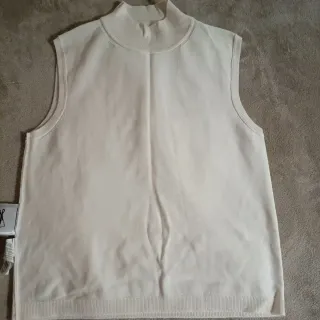 Chaleco de punto beige sin mangas