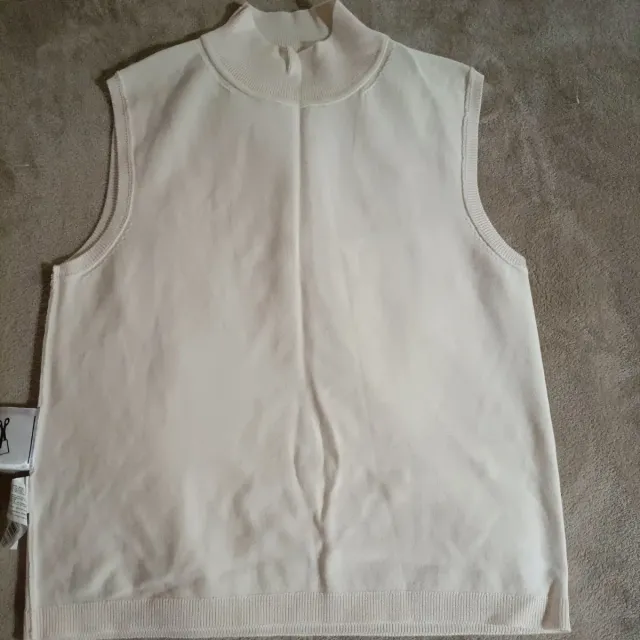 Chaleco de punto beige sin mangas